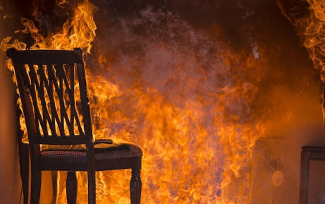 Living Room On Fire.  This stock image has a horizontal composition.